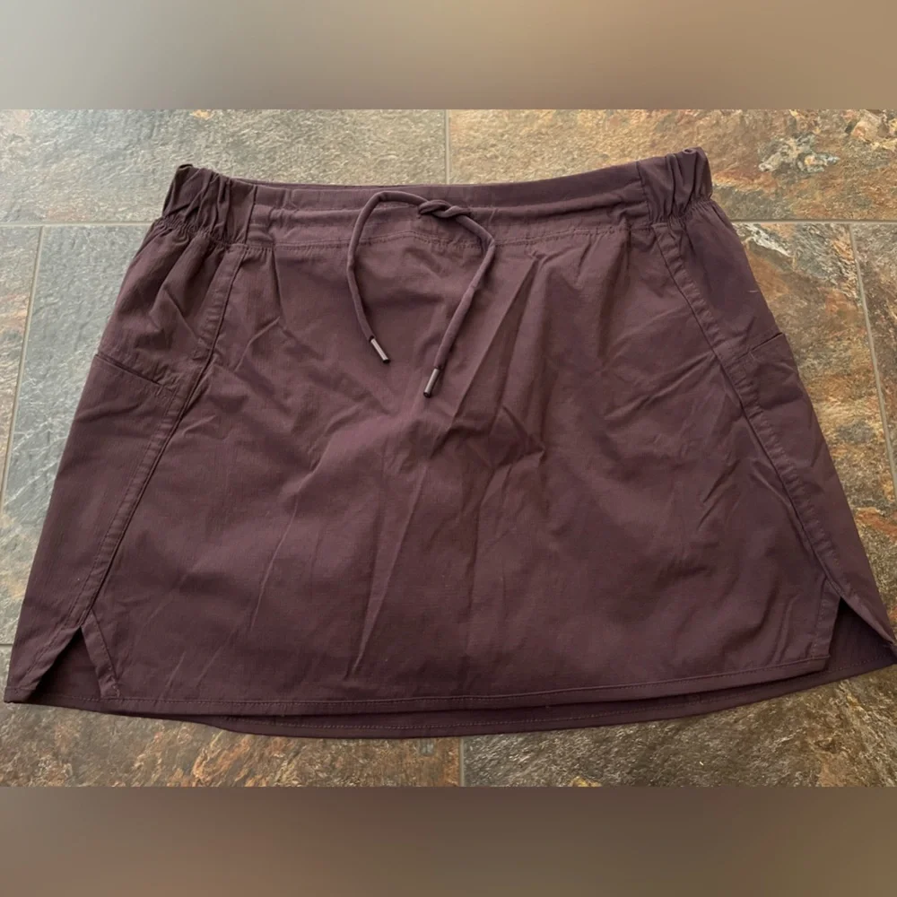 Women’s Te Verde dark purple active tennis pickleball skirt with pockets.Medium